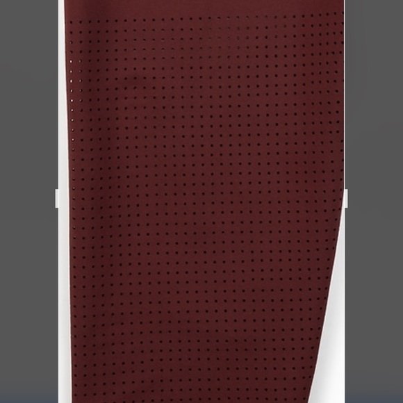 Athleta Interval High Rise Perforated Legging. Size medium. Color is Garnet - Picture 8 of 10